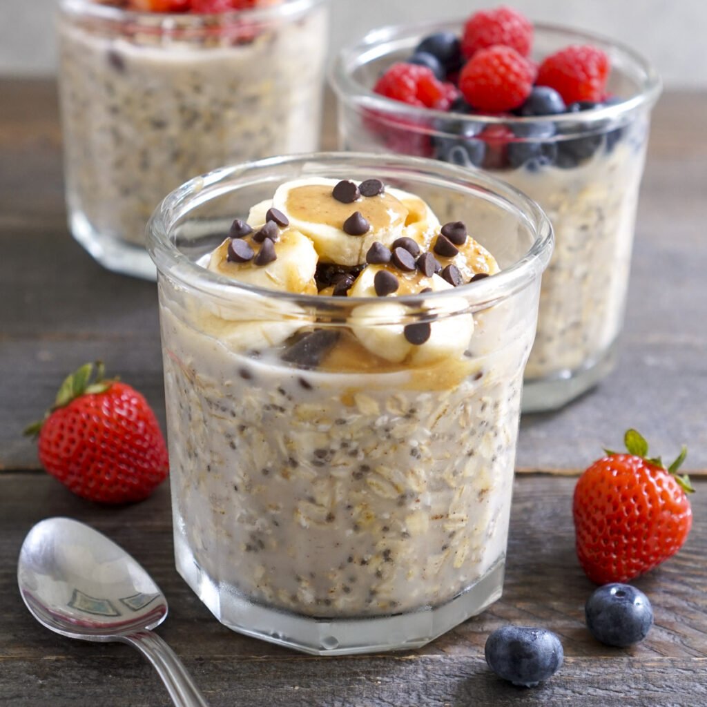 Chia seed oatmeal in a jar with bananas, chocolate chips, and peanut butter