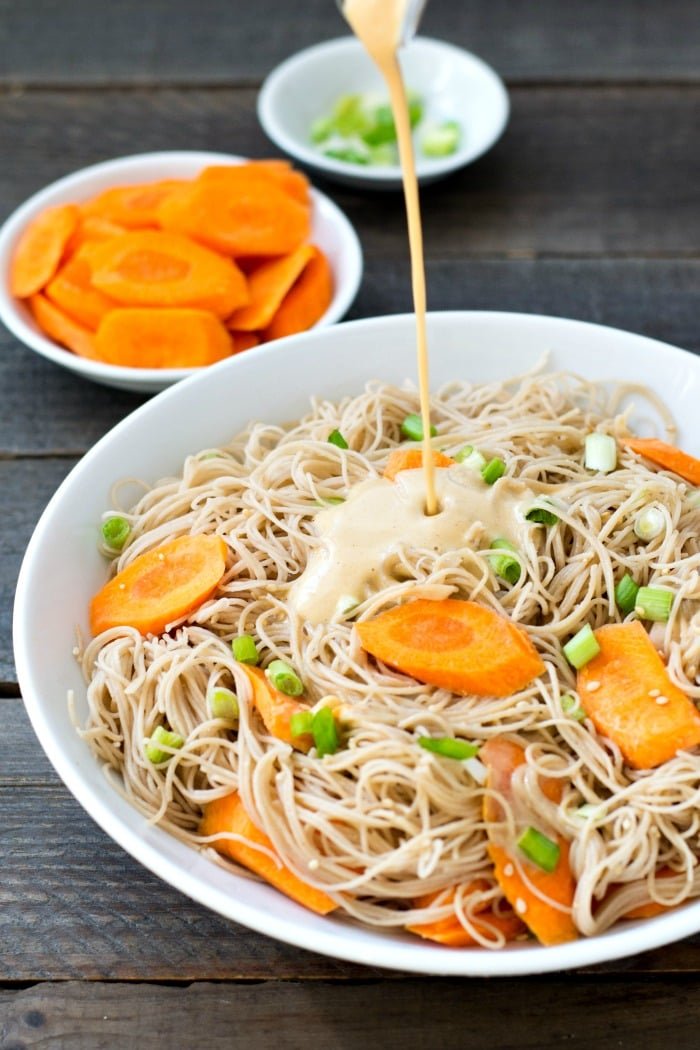 These rice noodles with peanut sauce are a healthy, kid-friendly, high-protein side dish. You'll love this easy recipe for a quick dinner.